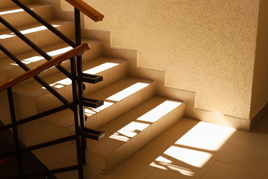 bigstock Sunlit Staircase With Railings 433532249