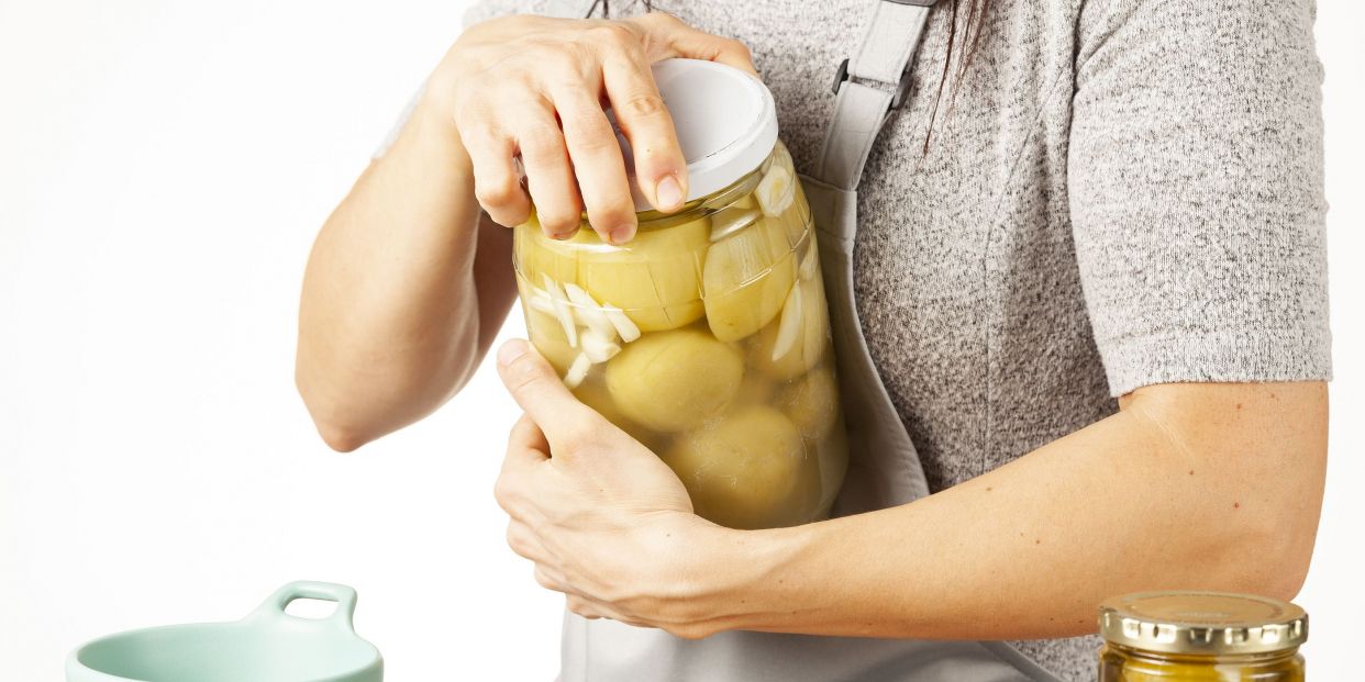 Man Sits On Jar