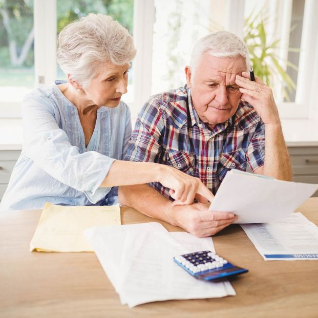 bigstock Worried senior couple checking 121639820